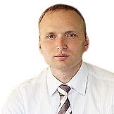Врач Коврежников Олег Иванович